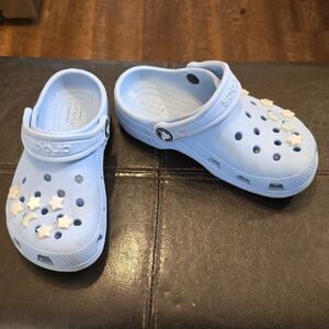 CROCS Kids Pale Blue Clogs with Star Charms